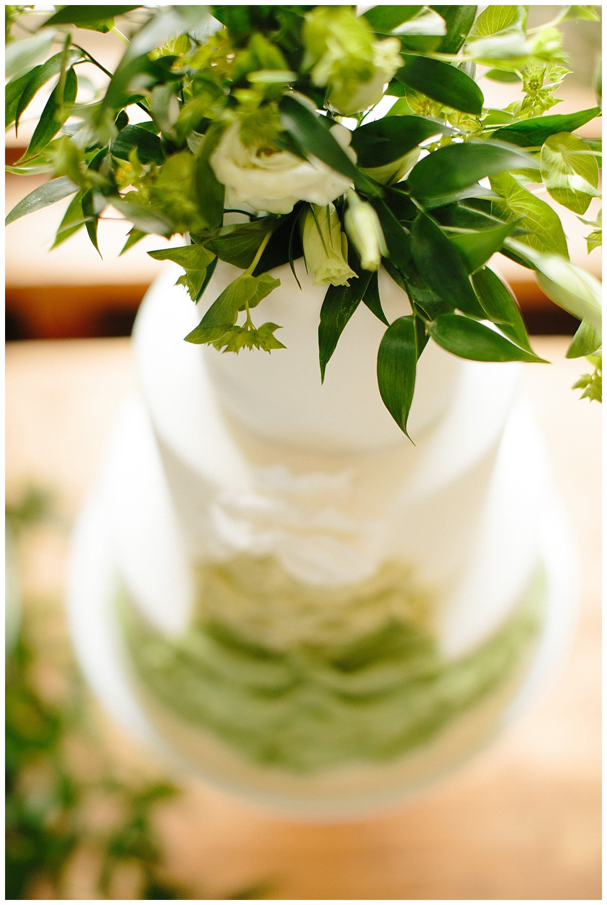 magnolia, wedding cake, greenery, detail